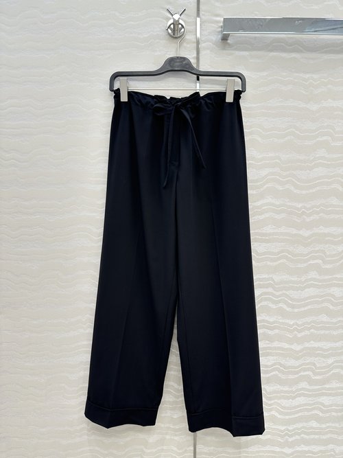 The Row Exclusive Original Row Style Wool Wide - Leg Trousers with a Stylish Design