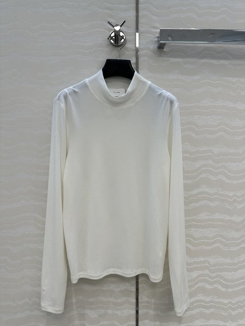 The Row Slimming Turtleneck Top with Collarbone Pleats in Exclusive Row Style