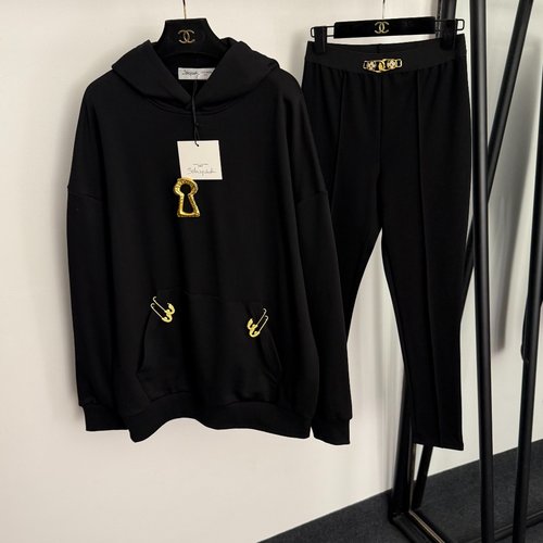 Schiaparelli Set: Long-sleeved Hoodie with Golden Keyhole Pin and Elastic Tights in Black
